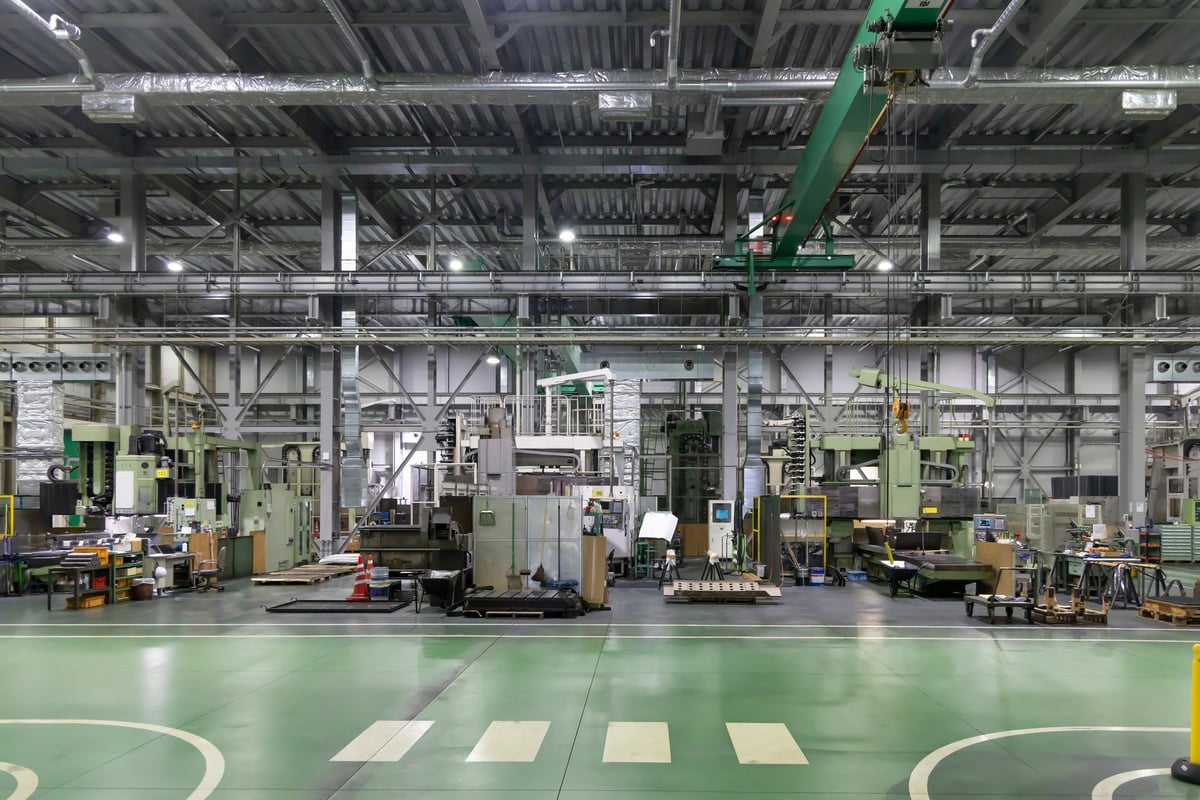 Factory floor lined with machine tools for industrial manufacturing